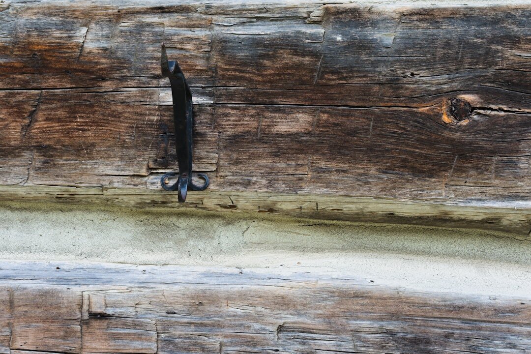 Car keys on a wooden surface