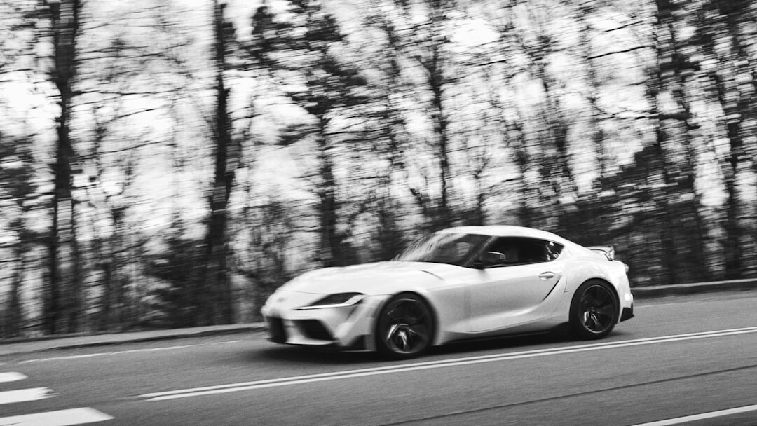 Car driving on a road with motion blur
